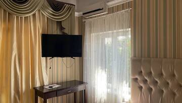 Трехместный номер с балконом в Гостевом доме Димерчи